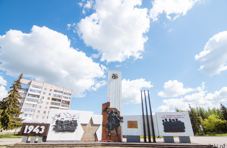 Город